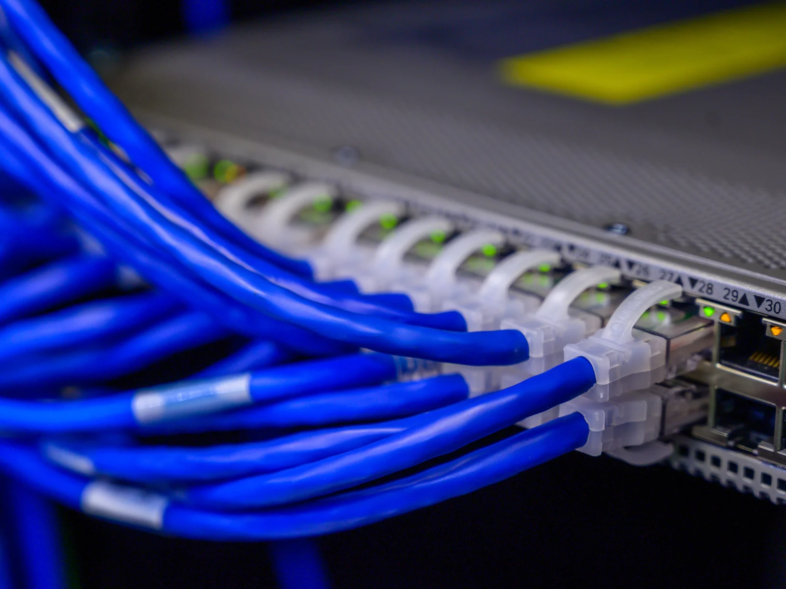 Network cables connected to Ethernet ports